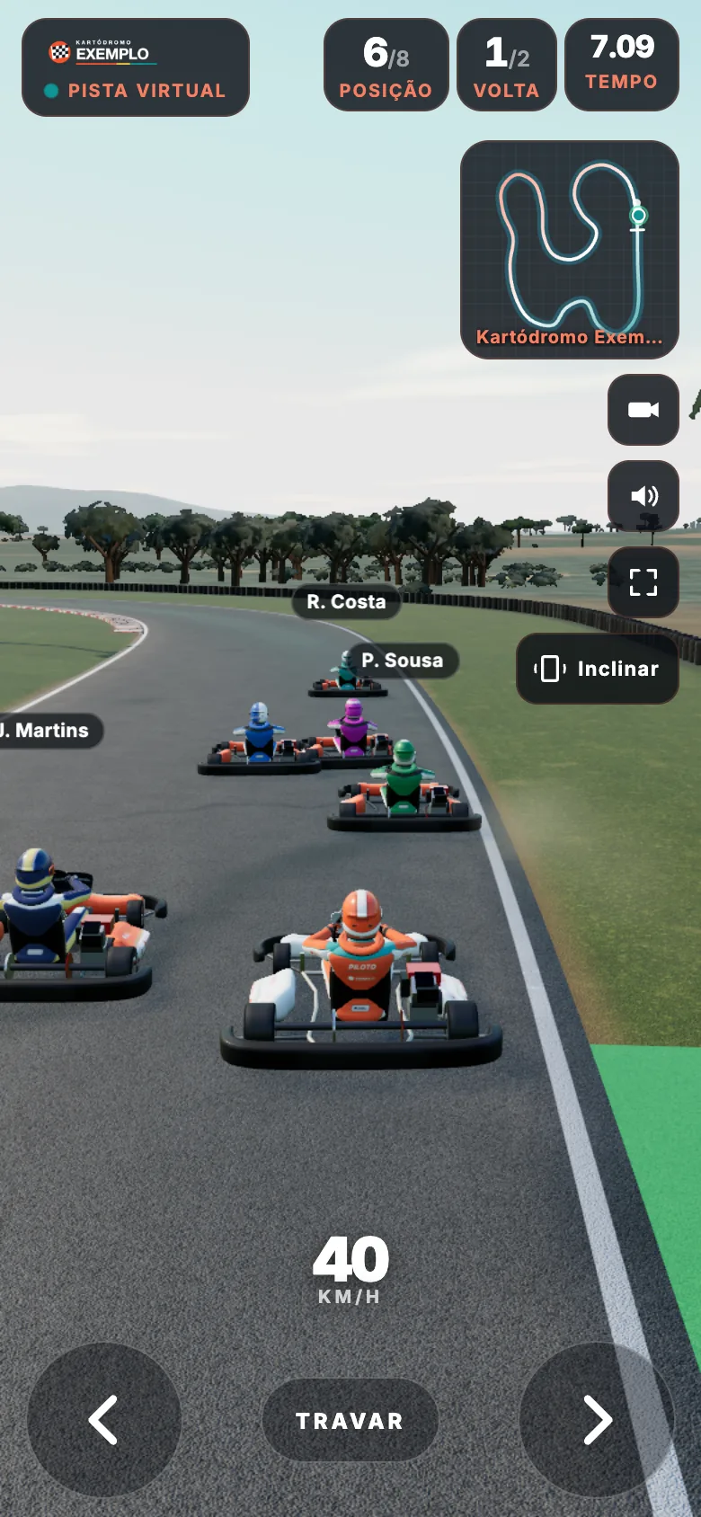 Racing on a phone against the karts of the track's fleet